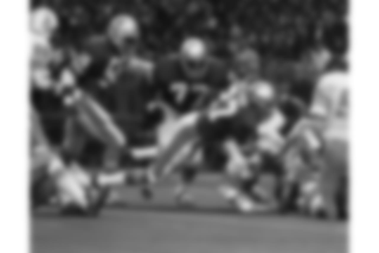 Seattle Seahawks safety Autry Beamon (27) tackles Houston Oilers running back Mike Voight (31) during an NFL game in Seattle, Wash., Nov. 20, 1977. The Oilers defeated the Seahawks 22-10. (AP Photo/NFL Photos)