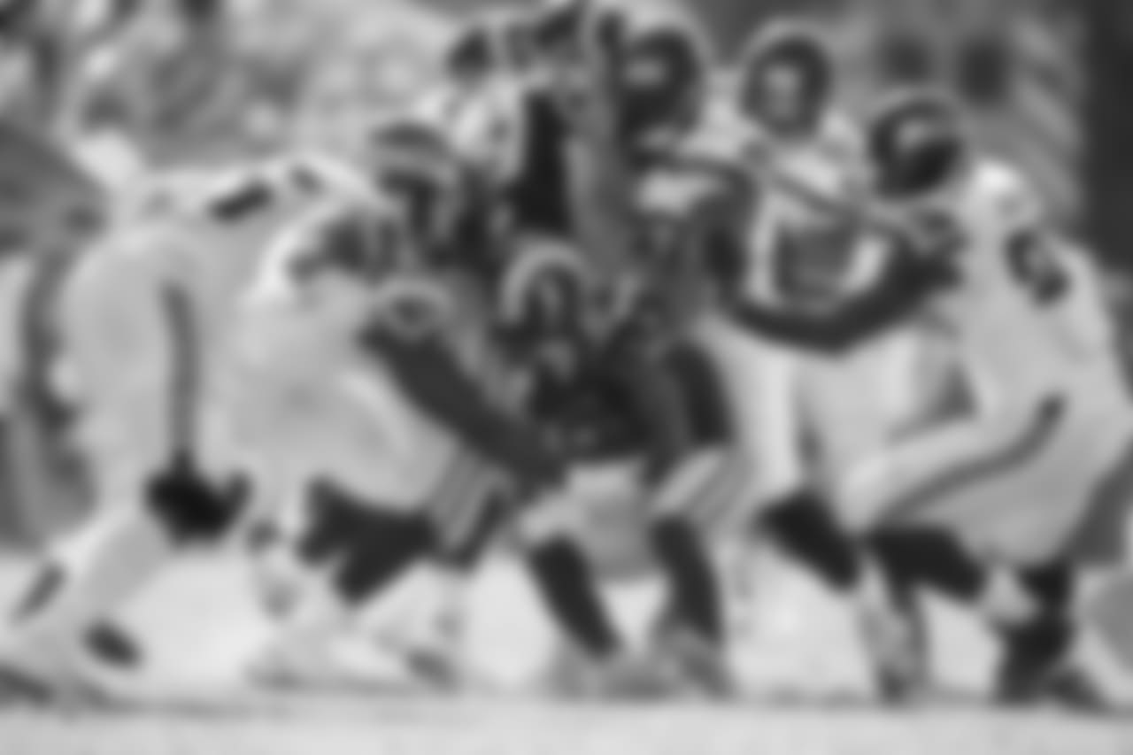 Seattle's defense swarms around Los Angeles receiver Tavon Austin in the fourth quarter.