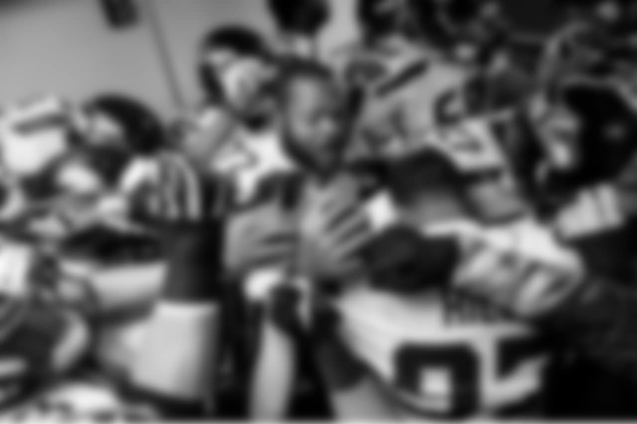 Michael Bennett gathers the team around him just before the Seahawks left the locker room for kickoff.