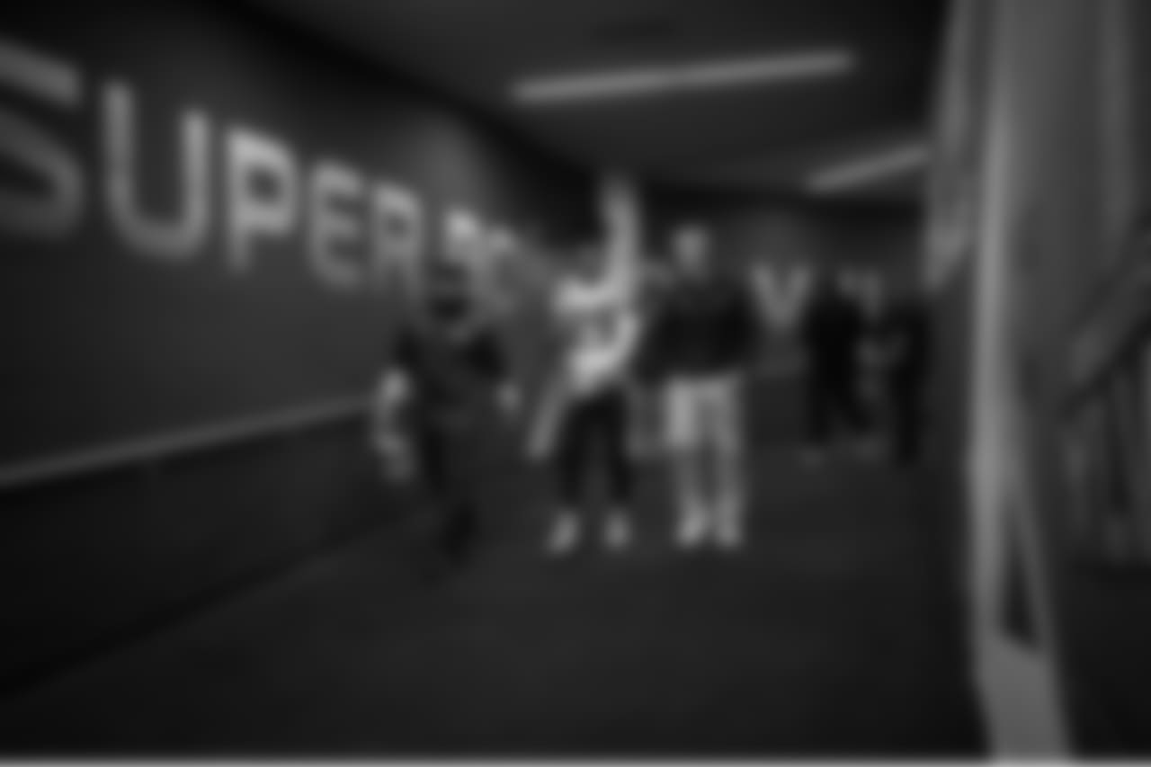 Head coach Pete Carroll and safety Earl Thomas walk down the tunnel from the locker room back to the field after the long halftime intermission.
