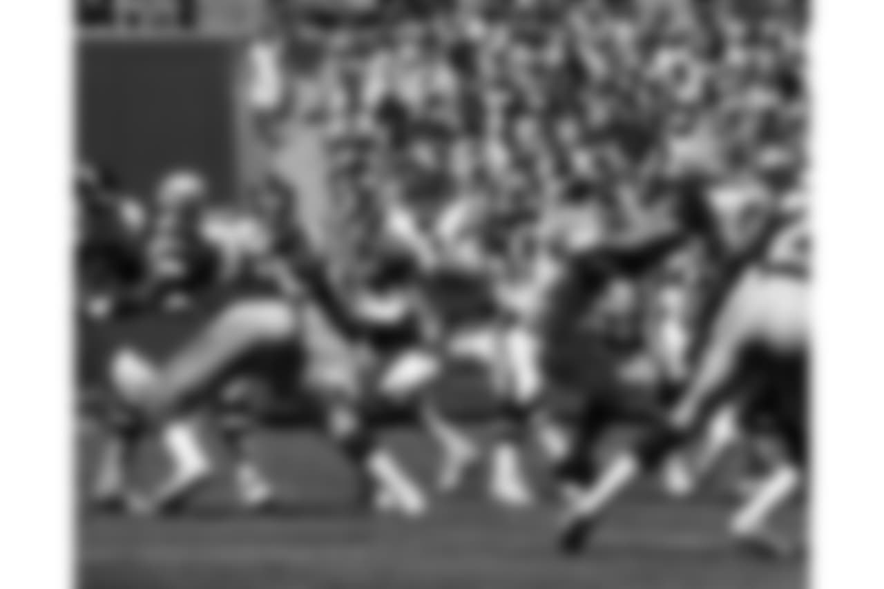 San Diego Chargers Hall of Fame quarterback Dan Fouts (14) drops back to pass during an NFL game against the Seattle Seahawks in San Diego, Sept. 15,1985. The Seahawks defeated the Chargers 49-35. (AP Photo/NFL Photos)