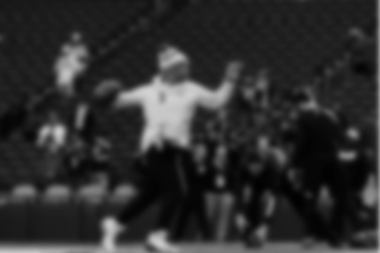 Quarterback Russell Wilson warms up before the game.