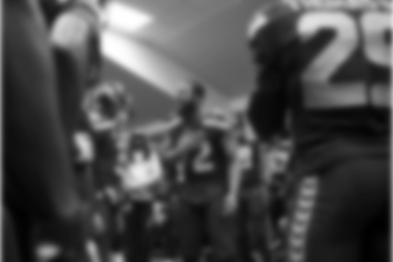 Team leader Michael Bennett makes an impassioned pregame speech to the team just moments before the take the field for kickoff against the visiting San Francisco 49ers.