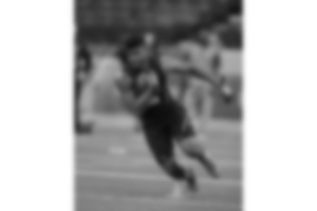 San Diego State running back Rashaad Penny runs a drill during the NFL football scouting combine, Friday, March 2, 2018, in Indianapolis. (AP Photo/Darron Cummings)