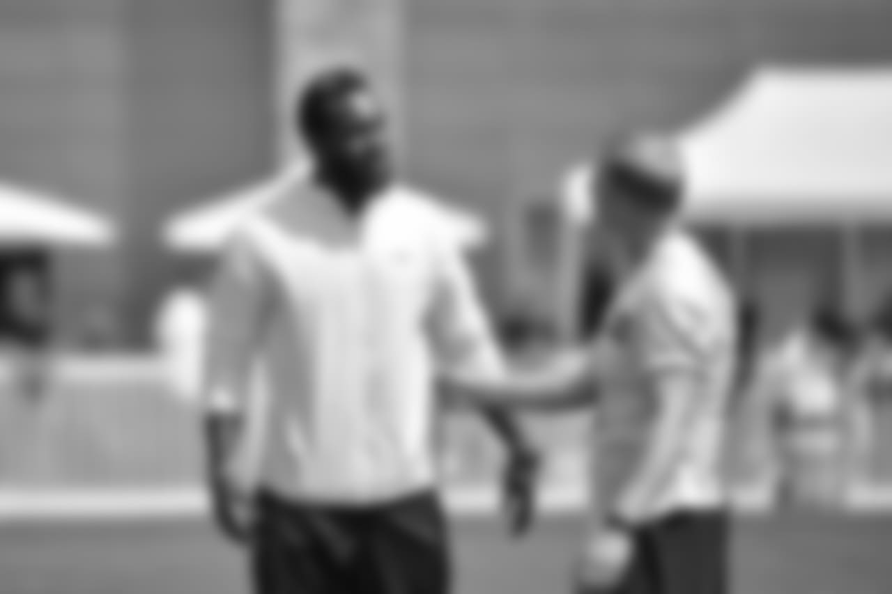 SS Kam Chancellor, left, and P Jon Ryan, right