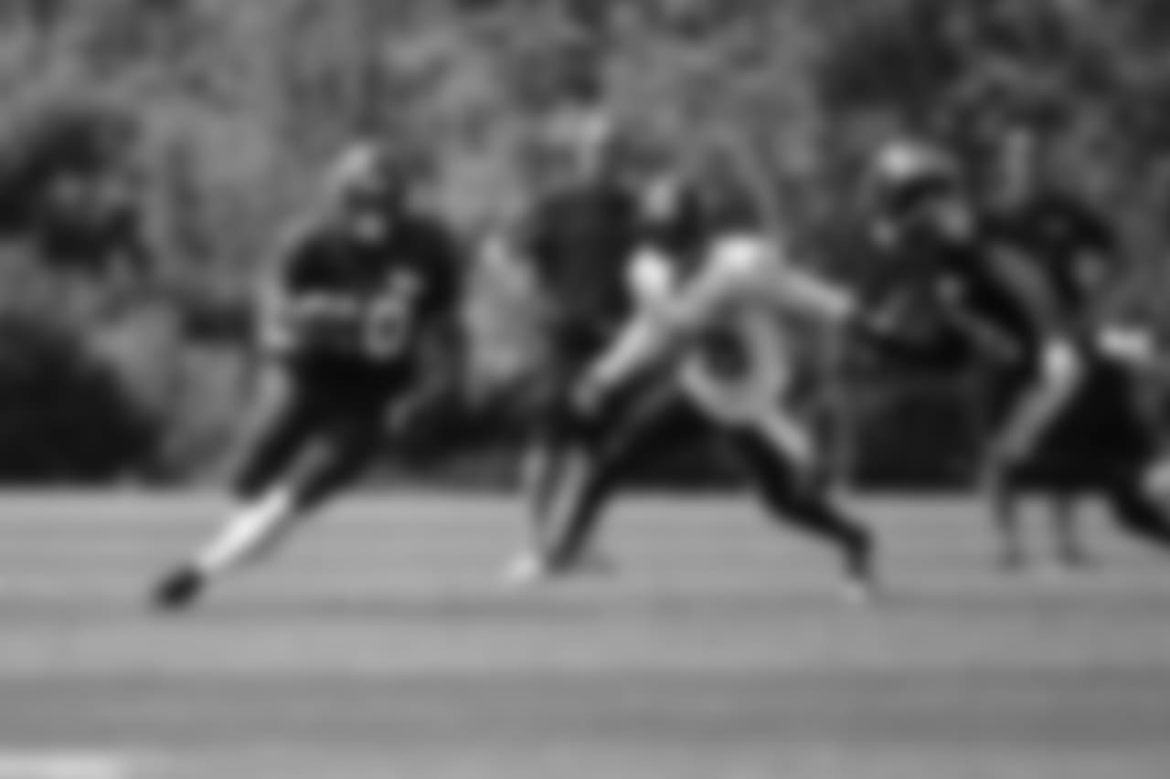 RB Rashaad Penny, left
