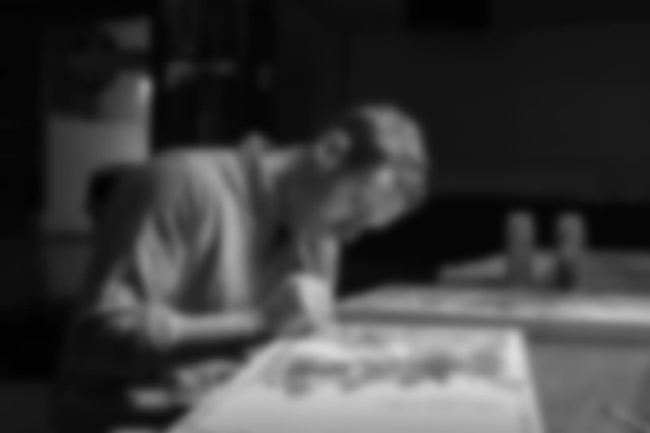 Jon Norquist from Coffee on Canvas (CoffeeOnCanvas.com) creates a piece of artwork for the Seahawks schedule release.