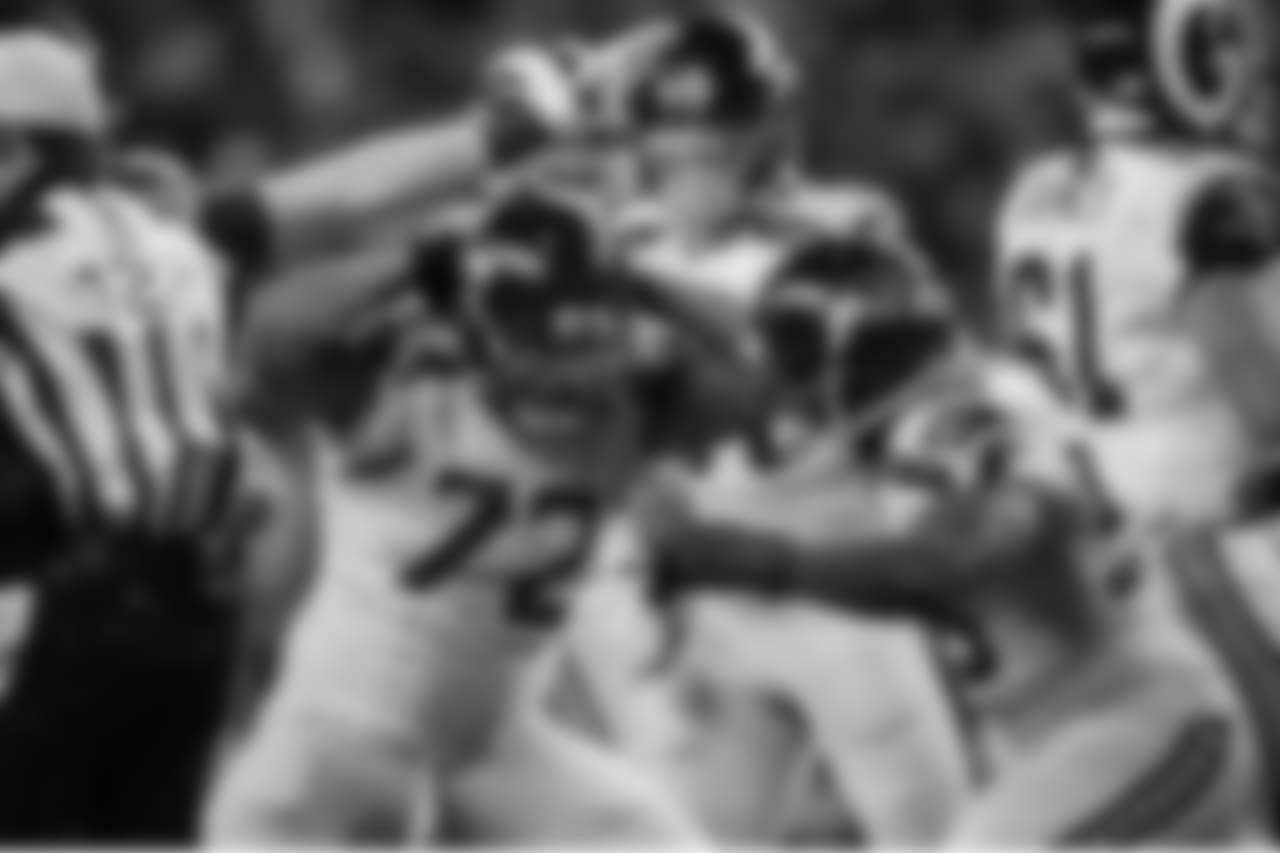 Michael Bennett celebrates his sack with Cliff Avril.