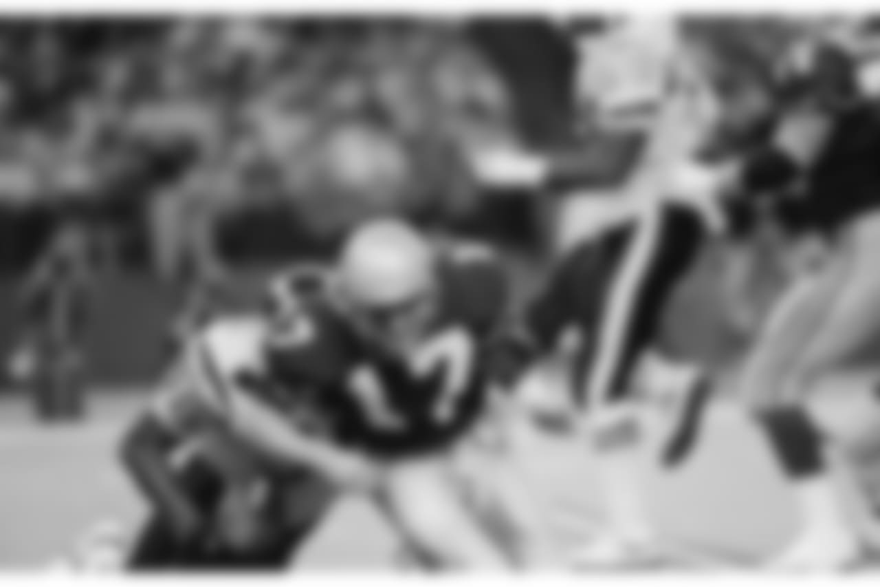 Quarterback Dave Krieg (17) of the Seattle Seahawks fumbles the football as he is sacked for a 13-yard loss by linebacker Gerald Robinson (98) of the San Diego Chargers during the third quarter of their NFL game in Seattle, Nov. 5, 1990. Seattle recovered the fumble on the play but lost the game to San Diego 31-14. (AP Photo/Duncan Livingston)