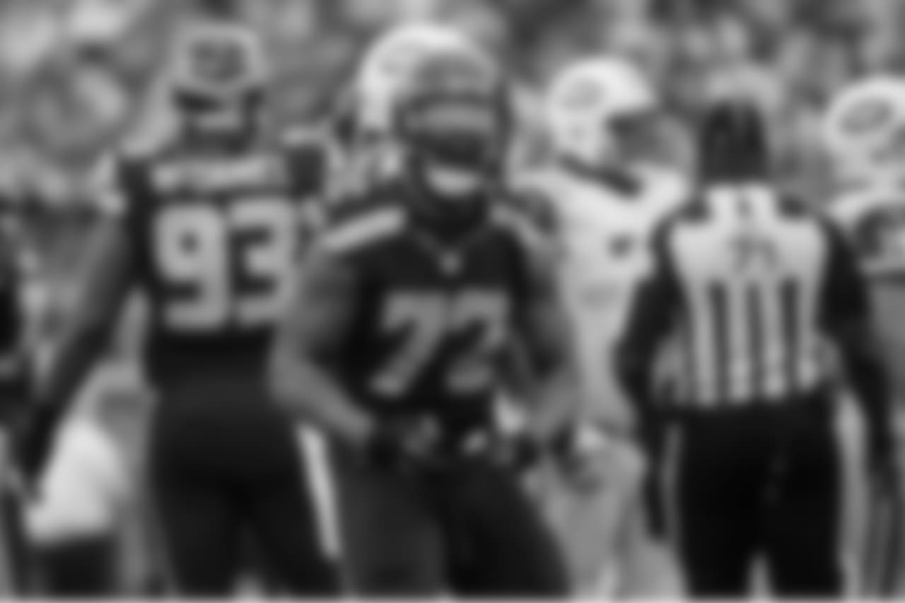 Michael Bennett strikes a pose after sacking Jet's quarterback Ryan Fitzpatrick.