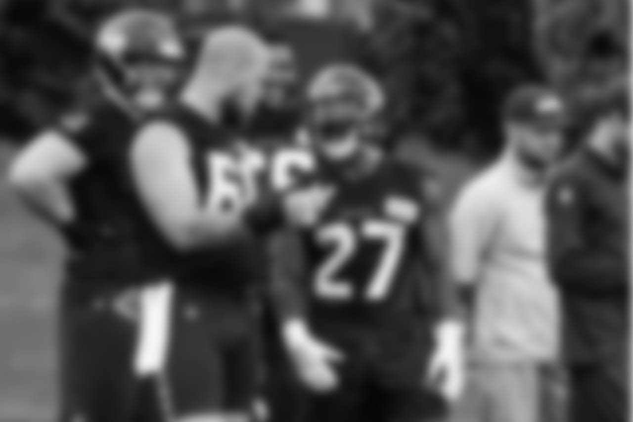 C Justin Britt, left, and RB Mike Davis, right