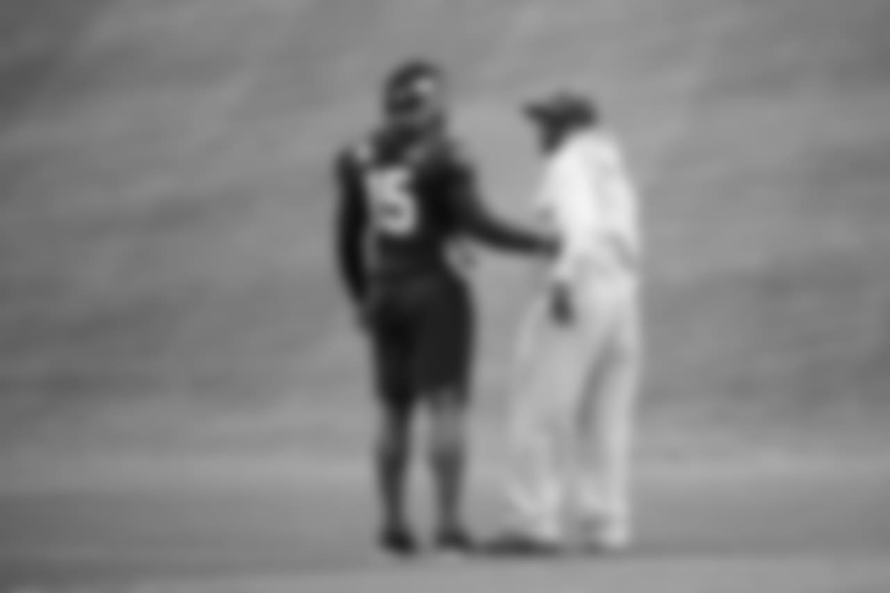 WR Brandon Marshall, left, meets with former Seahawks receiver Darrell Jackson.