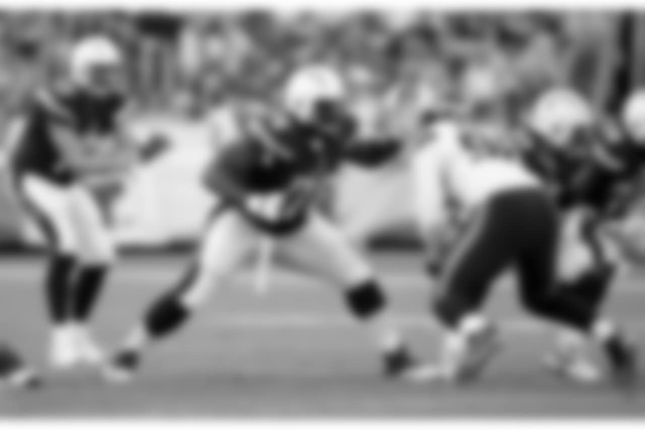 San Diego Chargers tackle D.J. Fluker (76) blocks during the 2015 NFL preseason football game against the Seattle Seahawks on Saturday, Aug. 29, 2015 in San Diego. The Seahawks won the game 16-15. (Paul Spinelli via AP)