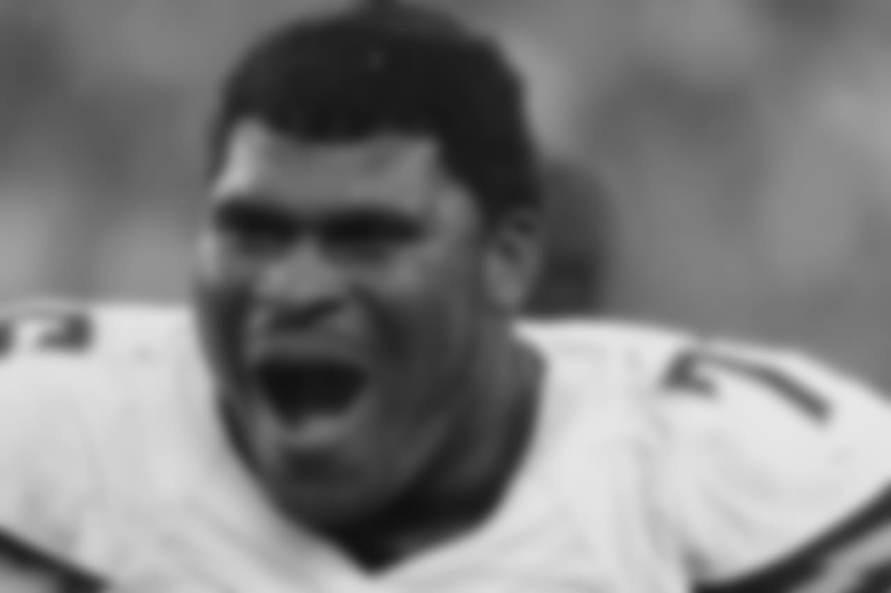 San Diego Chargers offensive tackle D.J. Fluker watches from the sidelines in the second half of an NFL wild-card playoff football game against the Cincinnati Bengals Sunday, Jan. 5, 2014, in Cincinnati. (AP Photo/Tom Uhlman)