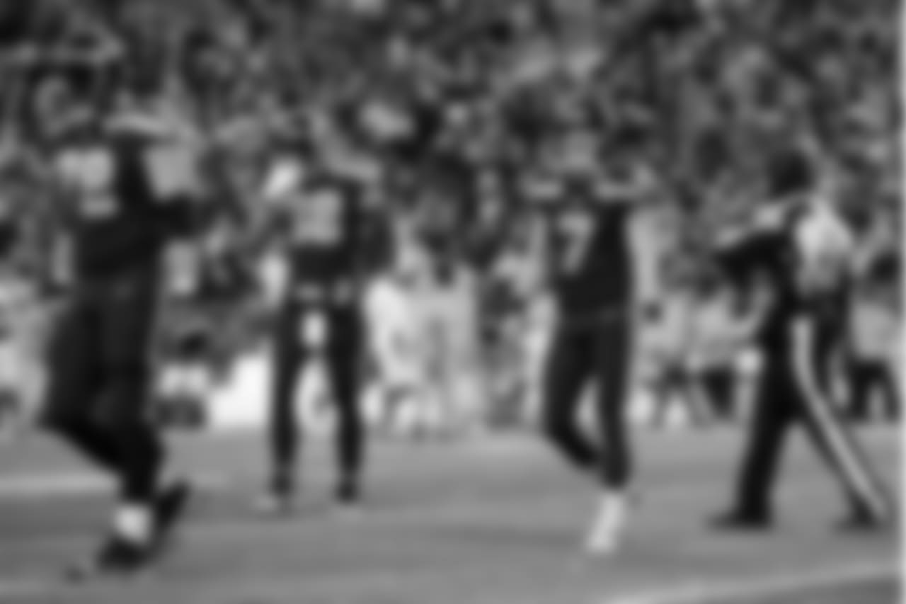 Seahawks kicker Blair Walsh, along with teammates Luke Joeckel and Jimmy Graham, walk off the field after a missed field goal in the fourth quarter.