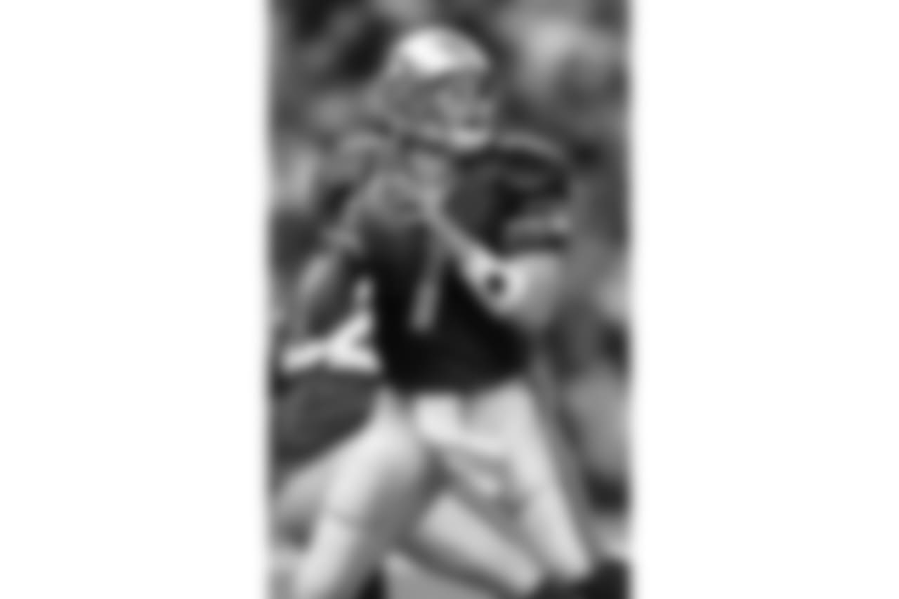 Seattle Seahawk quarterback Jon Kitna looks to complete a pass during the Seahawks 20-18 win over the Tennessee Oilers Sunday, Nov. 19, 1998, in Seattle. It was Kitna's first start since he replaced Warren Moon as the teams leader. (AP Photo/Barry Sweet)