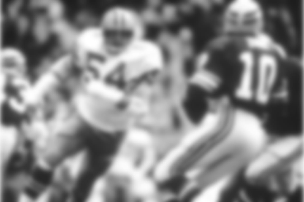 Pro Football Hall of Fame and Dallas Cowboys defensive tackle Randy White (54) coming in for the sack on Seattle Seahawks quarterback Jim Zorn (10) in the Cowboys 31-14 loss to the Seahawks at the Thanksgiving Day Game on 11/27/1986 at Texas Stadium in Irvine, Texas. (AP Photo / Al Messerschmidt)