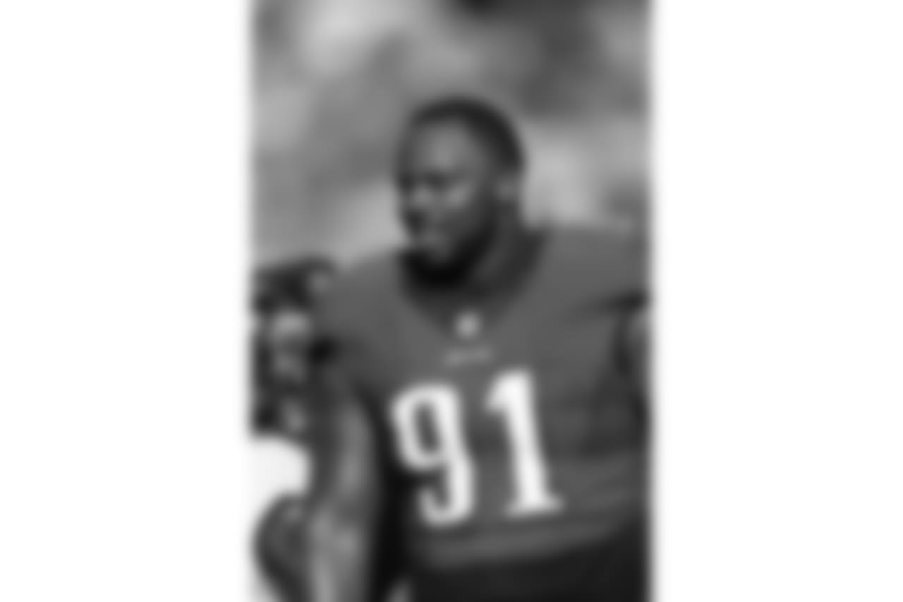 Philadelphia Eagles defensive tackle Fletcher Cox (91) looks up from the sideline with his helmet off during a NFL football game against the Atlanta Falcons, Sunday, November 13, 2016 in Philadelphia. The Eagles won the game 24-15. (Paul Jasienski via AP)