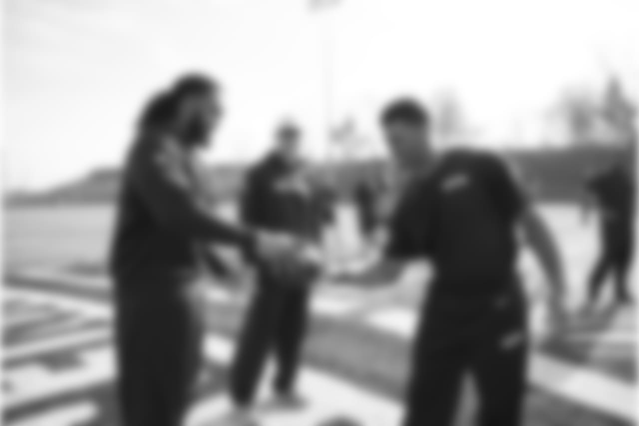 The mythical holiday of "Festivus" doesn't take place until December 23, but that didn't stop fullback Will Tukuafu and quarterback Russell Wilson from engaging in a "feat of strength" at walk thru. Each grabbed one and of a football and tried to wrestle form the other under the watchful eye of offensive coordinator Darrell Bevell.