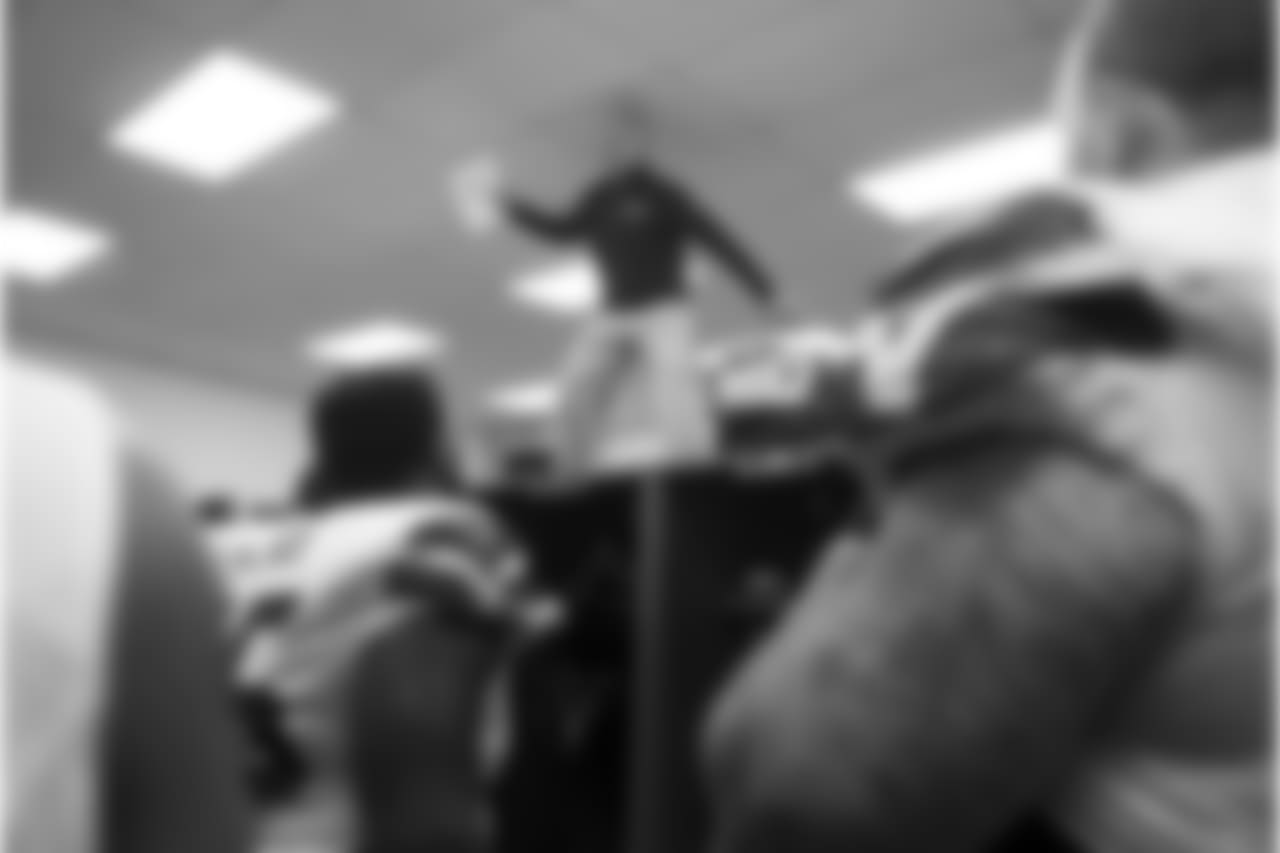 The visitors locker room in Baltimore is divided by a wall of lockers so Seahawks head coach Pete Carroll did the only thing he could in order to be seen by all the players -- he spoke to them from atop the lockers.