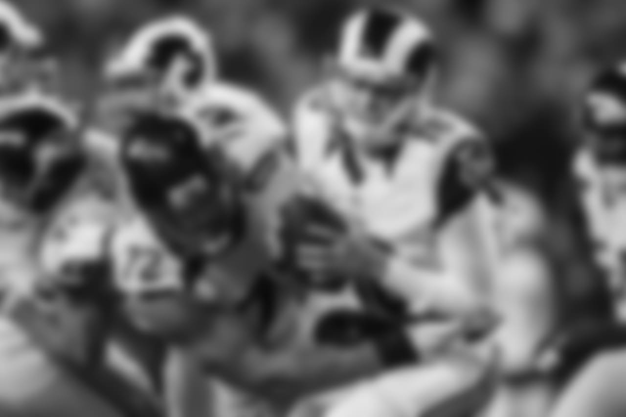 Michael Bennett sacks Jared Goff.