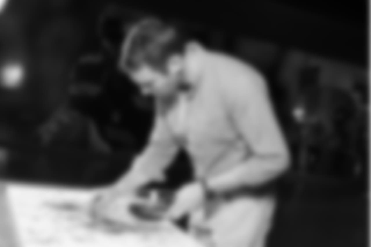Jon Norquist from Coffee on Canvas (CoffeeOnCanvas.com) creates a piece of artwork for the Seahawks schedule release.