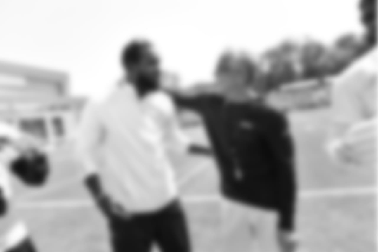 SS Kam Chancellor, left, and head coach Pete Carroll, right