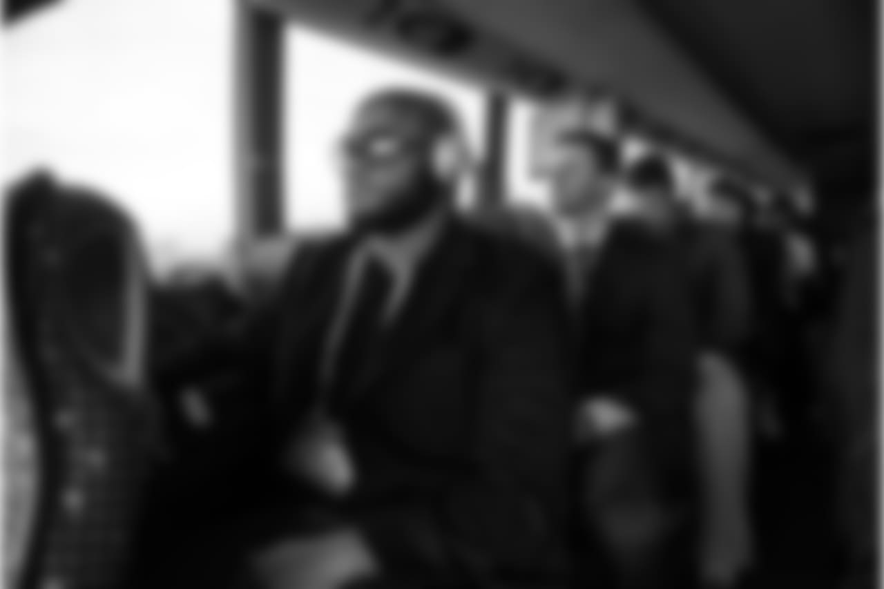 The bus is mostly silent for the trip from Jersey City to MetLife Stadium in East Rutherford. Michael Robinson, sits near the front, with Steven Hauschka behind him.