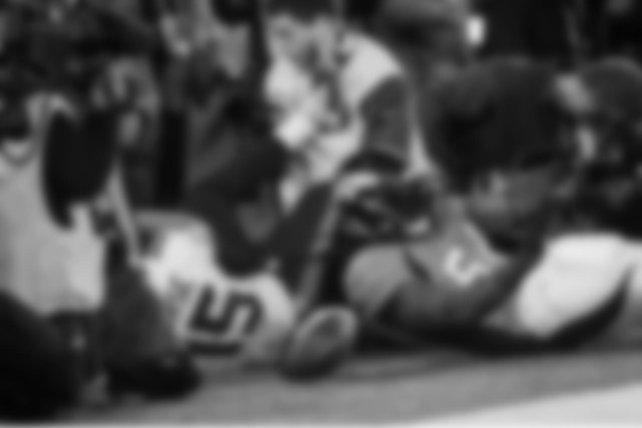 At the end of the play, Jermaine Kearse fell into the crowd of photographers on the end line, and inadvertently kicked Seahawks digital media staffer Brian Pan in the face. Pan escaped serious injury and remained in the game.