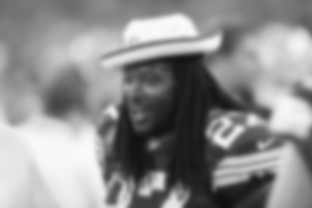 Green Bay Packers' Eddie Lacy on the sidelines during the second half of an NFL preseason football game against the Oakland Raiders Friday, Aug. 22, 2014, in Green Bay, Wis. (AP Photo/Mike Roemer)