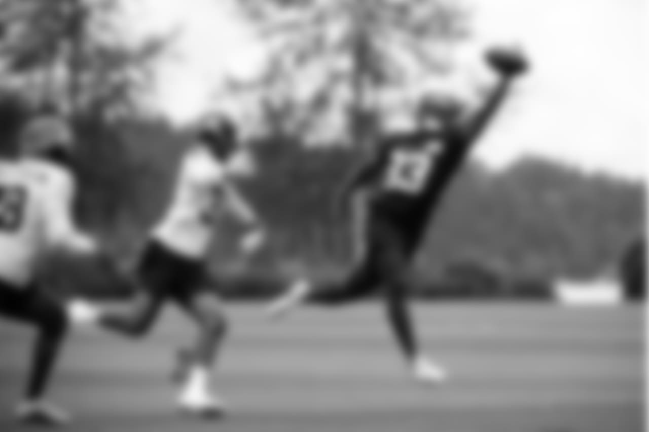 WR David Moore, right