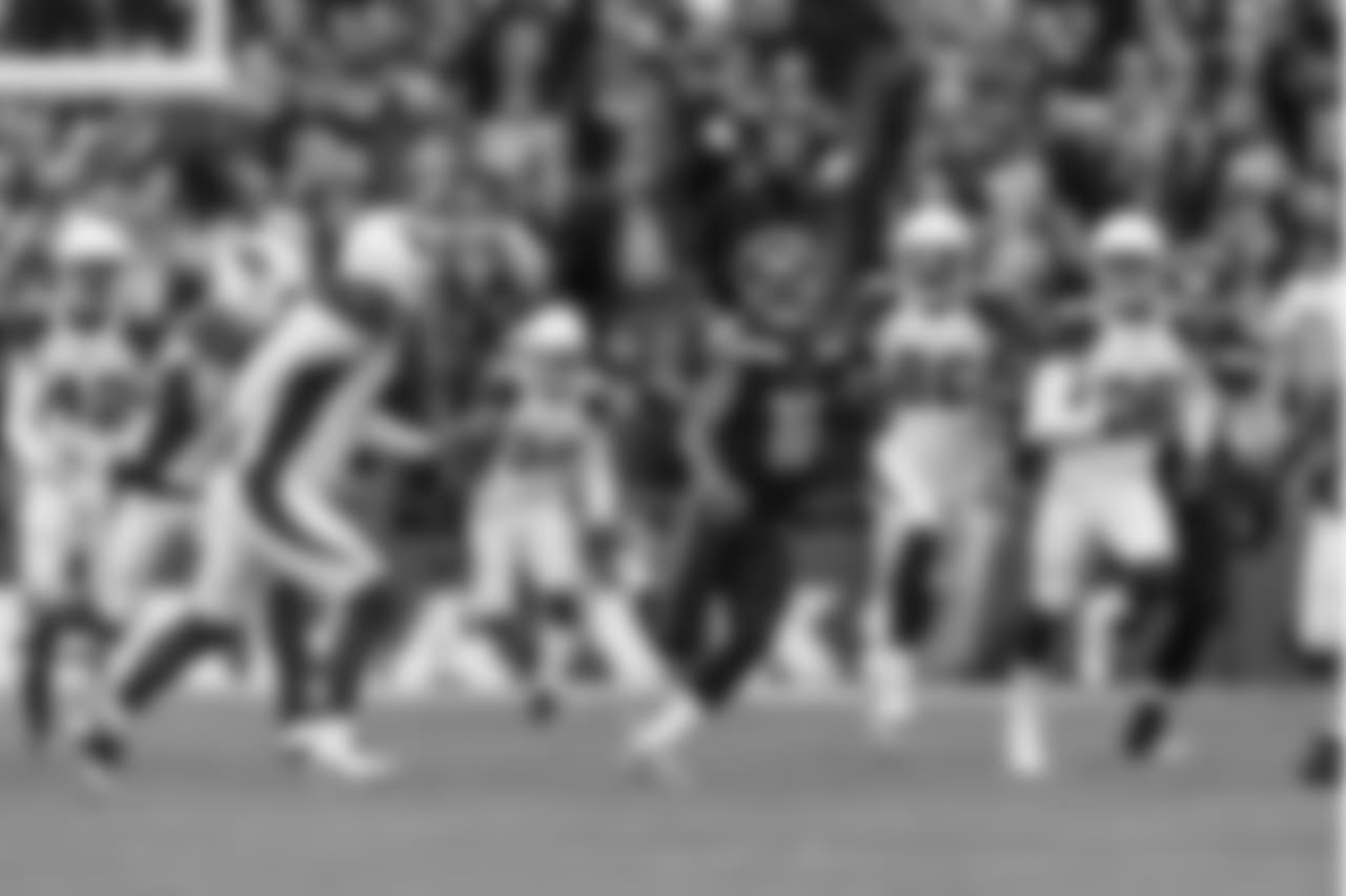 Seattle's Tyler Lockett heads upfield with a kickoff return for touchdown to put the Seahawks on the board.