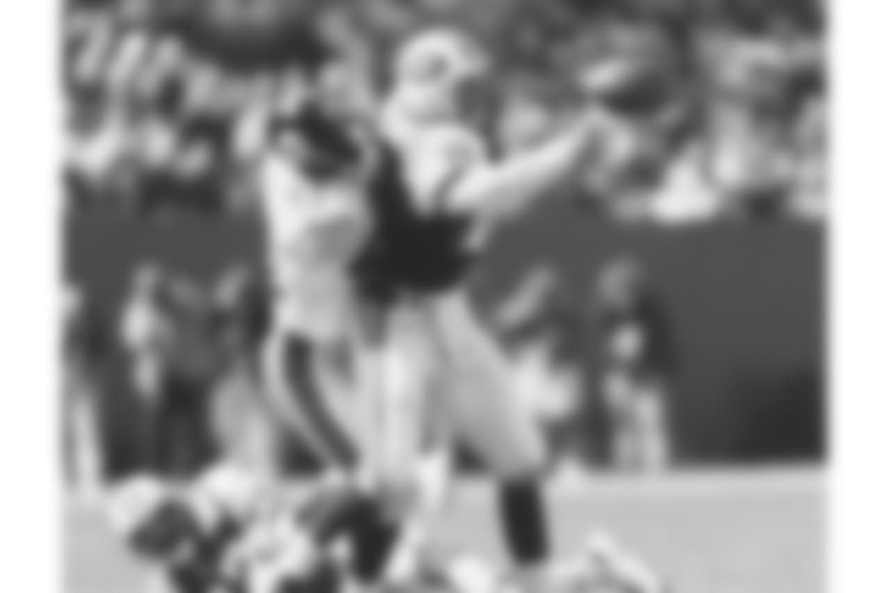 2. Jason Gildon (94-03) - 77 career QB sacks.