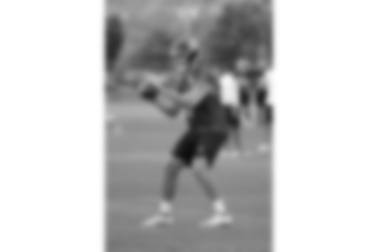 Tennessee Titans quarterback Luke Falk runs a drill during an organized team activity at the Titans' NFL football training facility Wednesday, May 30, 2018, in Nashville, Tenn. (AP Photo/Mark Humphrey)