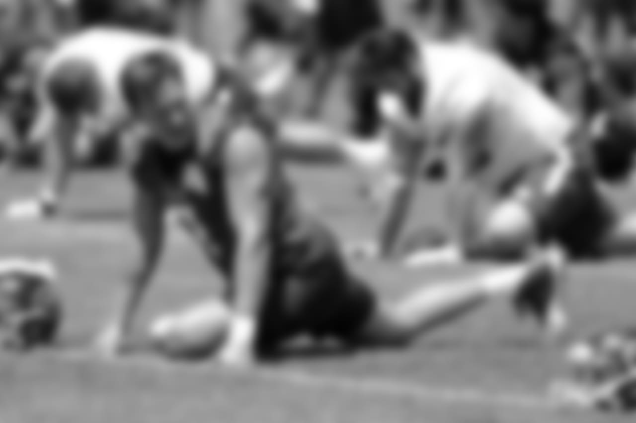 Tennessee Titans quarterback Blaine Gabbert (7) stretches during an organized team activity at the Titans' NFL football training facility Tuesday, June 5, 2018, in Nashville, Tenn. (AP Photo/Mark Humphrey)