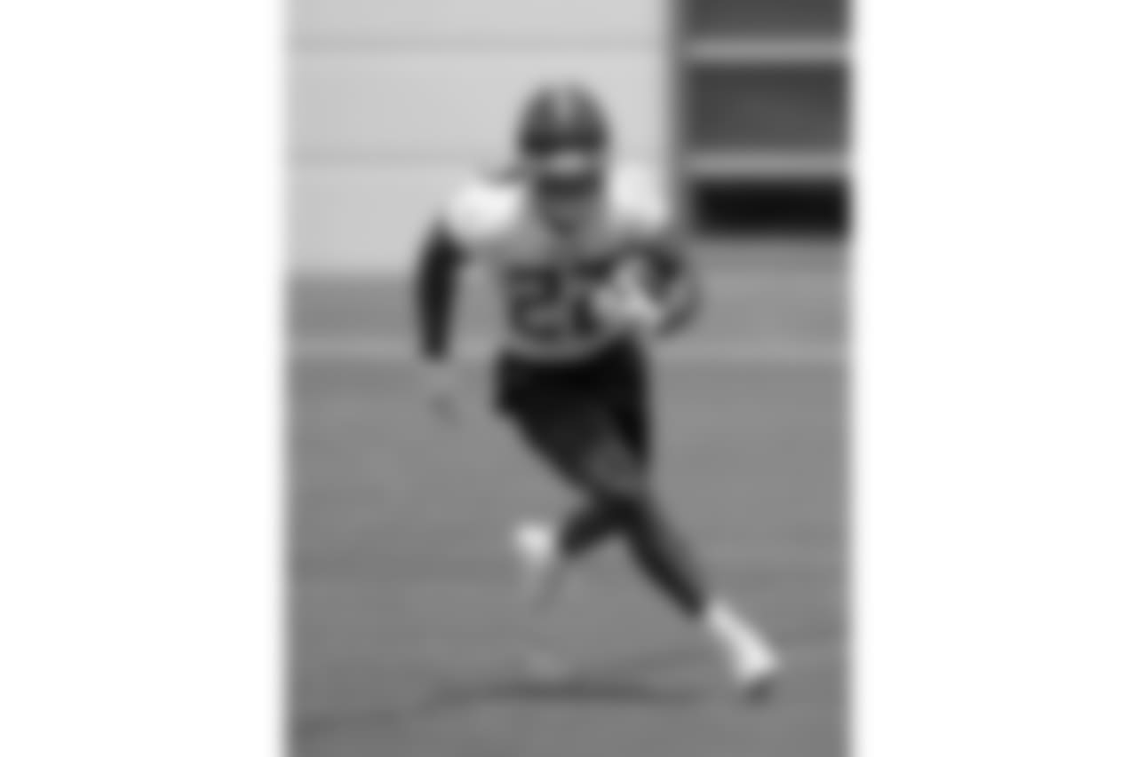 Tennessee Titans running back Derrick Henry (22) runs a drill during NFL football minicamp Tuesday, June 12, 2018, in Nashville, Tenn. (AP Photo/Mark Humphrey)