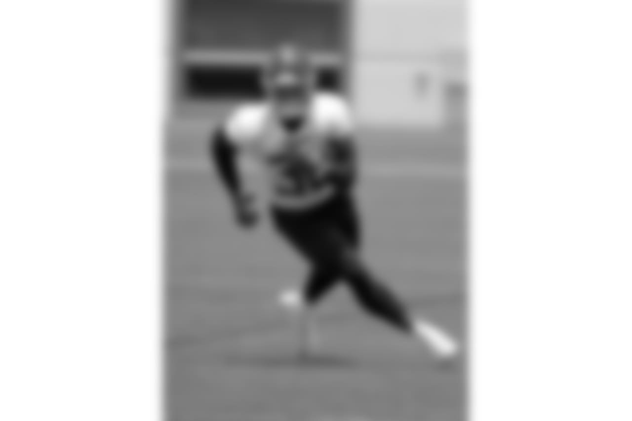 Tennessee Titans running back David Fluellen runs a drill during NFL football minicamp Tuesday, June 12, 2018, in Nashville, Tenn. (AP Photo/Mark Humphrey)