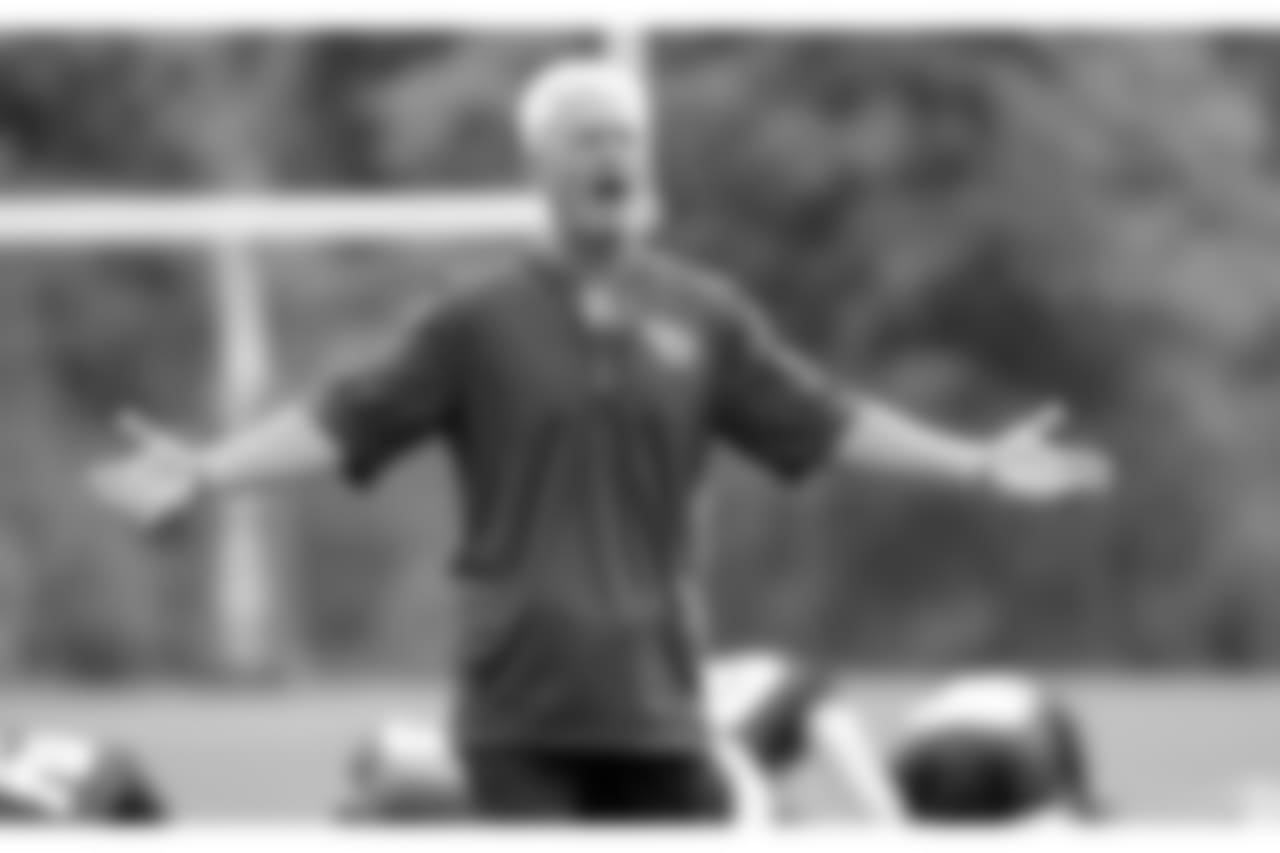 Tennessee Titans secondary coach Kerry Coombs yells to players during NFL football minicamp Wednesday, June 13, 2018, in Nashville, Tenn. (AP Photo/Mark Humphrey)