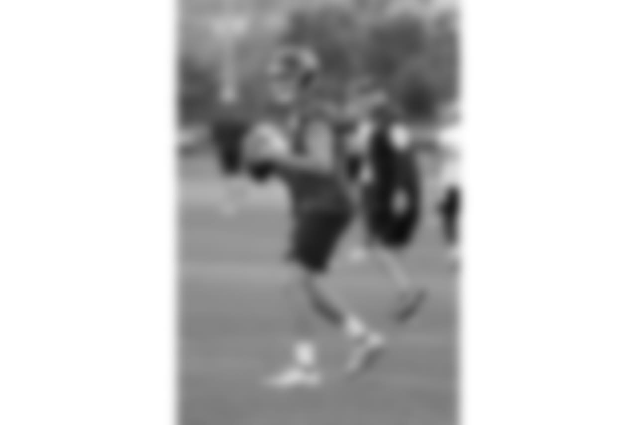 Tennessee Titans quarterback Luke Falk runs a drill during an organized team activity at the Titans' NFL football training facility Wednesday, May 30, 2018, in Nashville, Tenn. (AP Photo/Mark Humphrey)