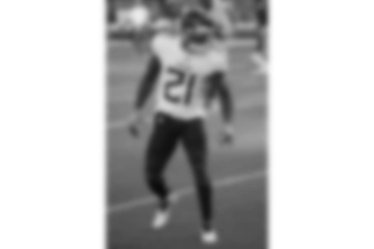 Tennessee Titans' Malcolm Butler warms up before a preseason NFL football game against the Green Bay Packers Thursday, Aug. 9, 2018, in Green Bay, Wis. (AP Photo/Matt Ludtke)