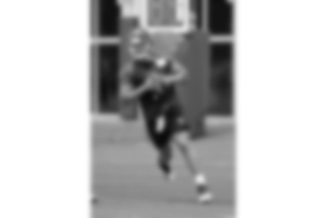 Tennessee Titans quarterback Blaine Gabbert runs a drill during an organized team activity at the Titans' NFL football training facility Wednesday, May 30, 2018, in Nashville, Tenn. (AP Photo/Mark Humphrey)