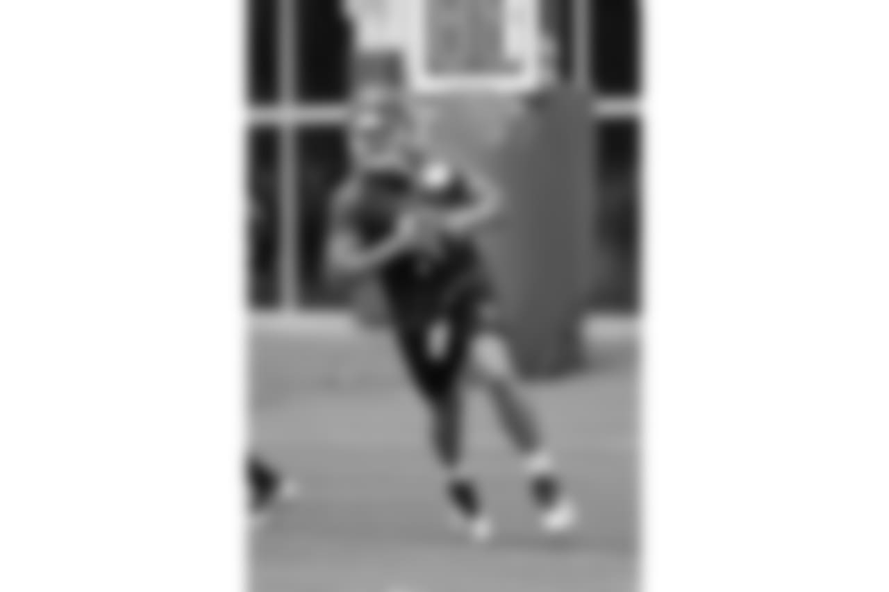 Tennessee Titans quarterback Blaine Gabbert runs a drill during an organized team activity at the Titans' NFL football training facility Wednesday, May 30, 2018, in Nashville, Tenn. (AP Photo/Mark Humphrey)