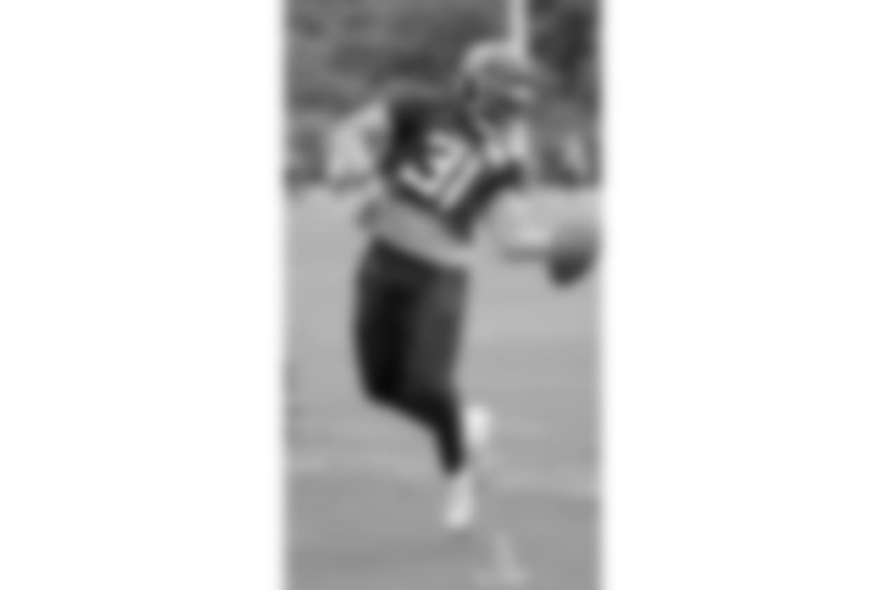 Tennessee Titans defensive back Kevin Byard runs a drill during NFL football minicamp Wednesday, June 13, 2018, in Nashville, Tenn. Byard is coming off an All-Pro season and the Titans upgraded their secondary by signing cornerback Malcolm Butler. Mix in veteran Logan Ryan and Adoree Jackson going into their second seasons together, and it's a group with high expectations for the season. (AP Photo/Mark Humphrey)