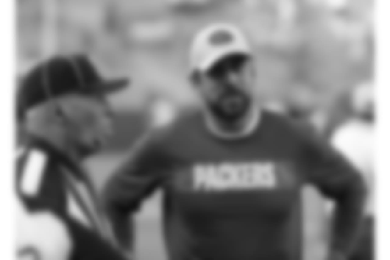 Green Bay Packers' Aaron Rodgers watches warm ups before a preseason NFL football game against the Tennessee Titans Thursday, Aug. 9, 2018, in Green Bay, Wis. (AP Photo/Mike Roemer)
