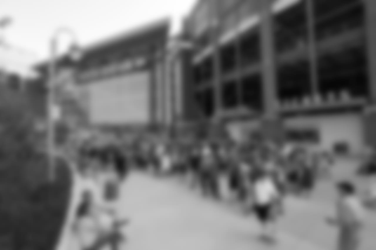 Fans line up outside Lambeau Field before a preseason NFL football game between the Green Bay Packers and the Tennessee Titans Thursday, Aug. 9, 2018, in Green Bay, Wis. (AP Photo/Matt Ludtke)