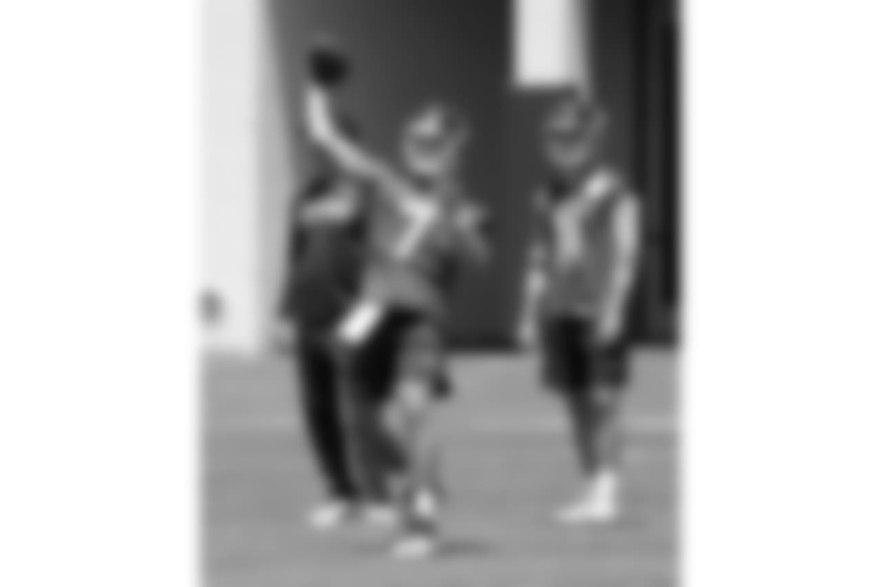 Tennessee Titans quarterback Blaine Gabbert (7) throws as quarterback Luke Falk (11) waits his turn to run a drill during an organized team activity at the Titans' NFL football training facility Tuesday, June 5, 2018, in Nashville, Tenn. (AP Photo/Mark Humphrey)