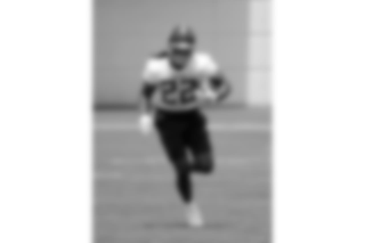 Tennessee Titans running back Derrick Henry (22) runs a drill during NFL football minicamp Tuesday, June 12, 2018, in Nashville, Tenn. (AP Photo/Mark Humphrey)