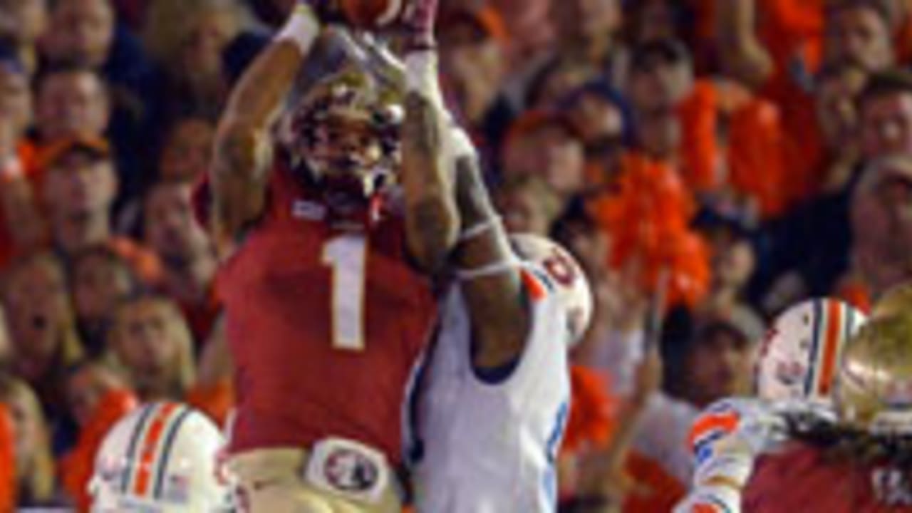 Texas wide receiver Lil'Jordan Humphrey, left, celebrates after scoring a  touchdown on a 15-yard reception with teammate John Burt (1) against  Oklahoma during the second half of an NCAA college fo …