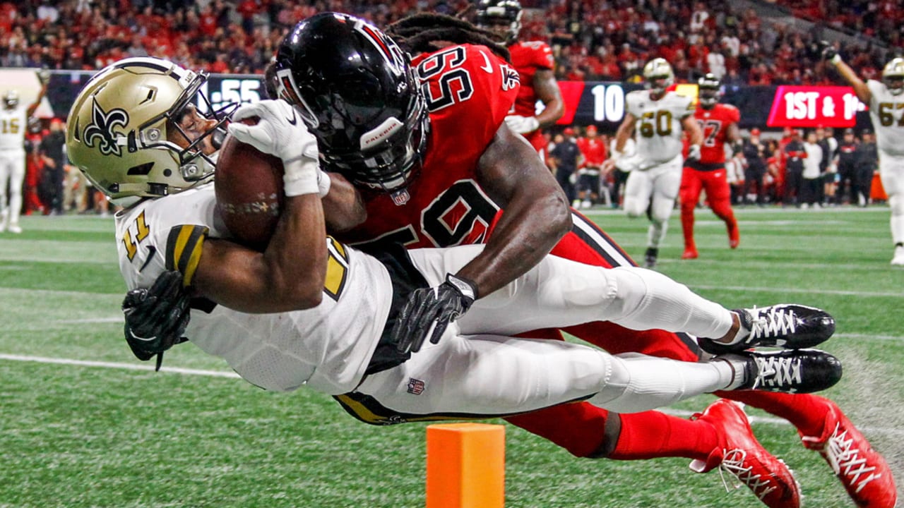 Atlanta Falcons middle linebacker Deion Jones (45) intercepts a ball in the  end zone ahead of New Orleans Saints tight end Josh Hill (89) during the  second half of an NFL football