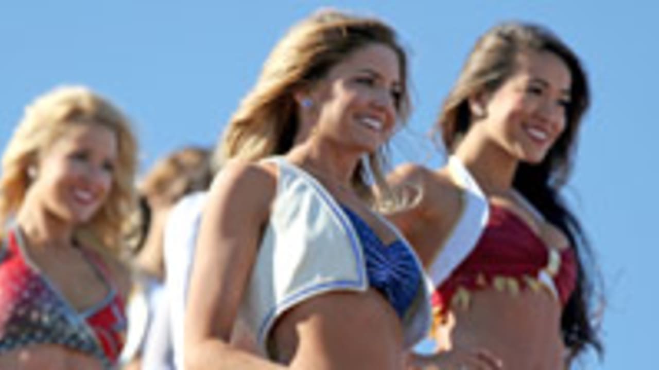 Melissa, a Seattle Seahawks cheerleader, (left) poses with Amber, a New  England Patriots cheerleader, for a photograph during the Pro Bowl  Cheerleaders photo shoot on Thursday, January 22, 2015 in Tempe, AZ. (